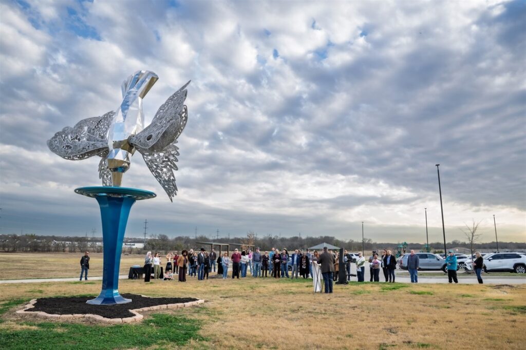 City news public art sipping from wetland crowd
